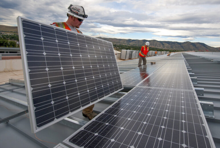 investigating climate change pledges Colorado solar roof project US Dept. of Energy
