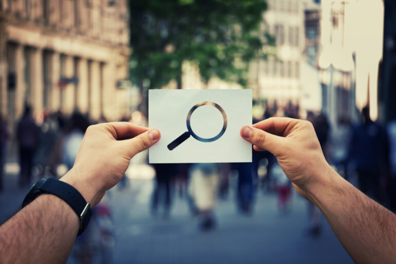 street crowd mobile magnifying glass investigation
