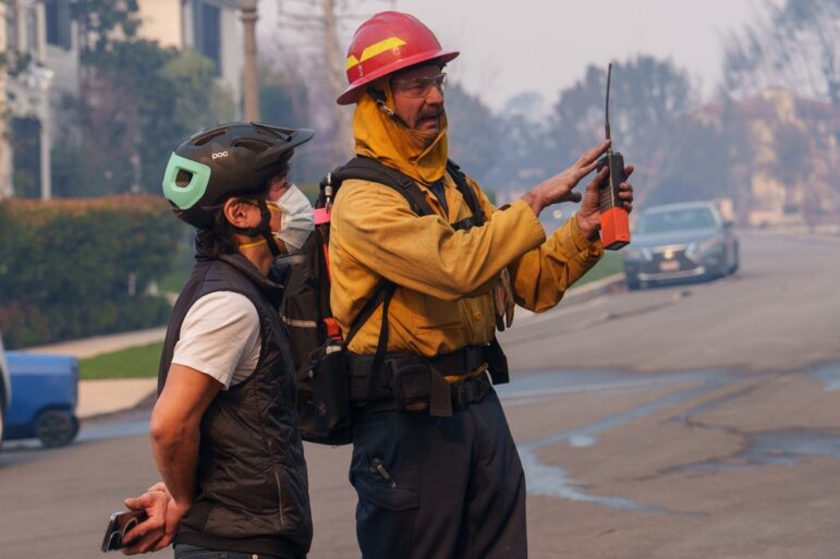 Firefighters on the front lines of the 2025 Pacific Palisades fire near Los Angeles. Image: Shutterstock
